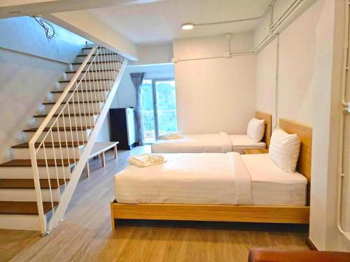 Imagen de la habitación del The Ventus Phangan Loft Apartments. Foto 13