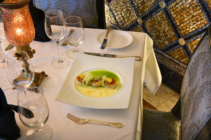 Imagen del bar/restaurante del The Villa Casa Casuarina. Foto 11