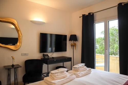 Imagen de la habitación del The White Knight Premium Boutique Hotel. Foto 18