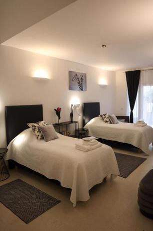 Imagen de la habitación del The White Knight Premium Boutique Hotel. Foto 19