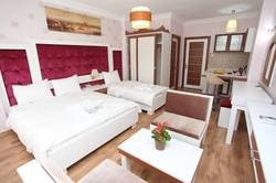 Imagen de la habitación del The White Suites. Foto 17