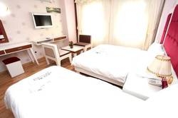 Imagen de la habitación del The White Suites. Foto 19