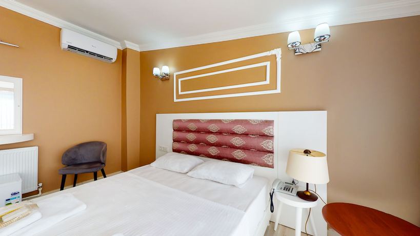 Imagen de la habitación del The Wolf Hotel. Foto 2