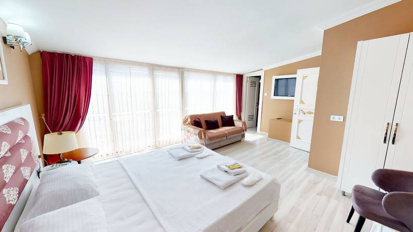 Imagen de la habitación del The Wolf Hotel. Foto 3