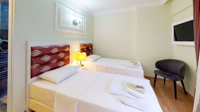 Imagen de la habitación del The Wolf Hotel. Foto 4