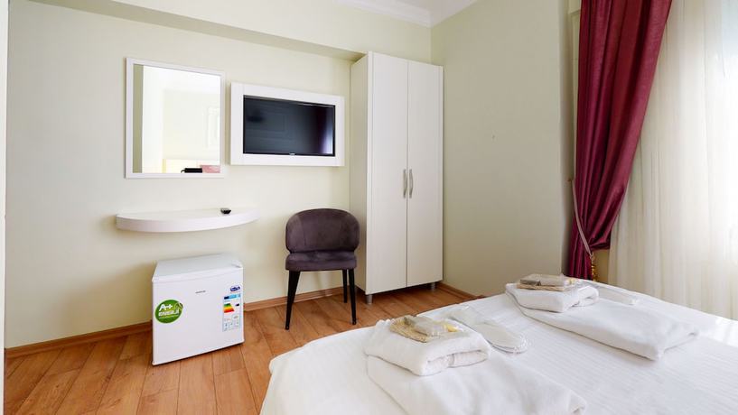 Imagen de la habitación del The Wolf Hotel. Foto 8