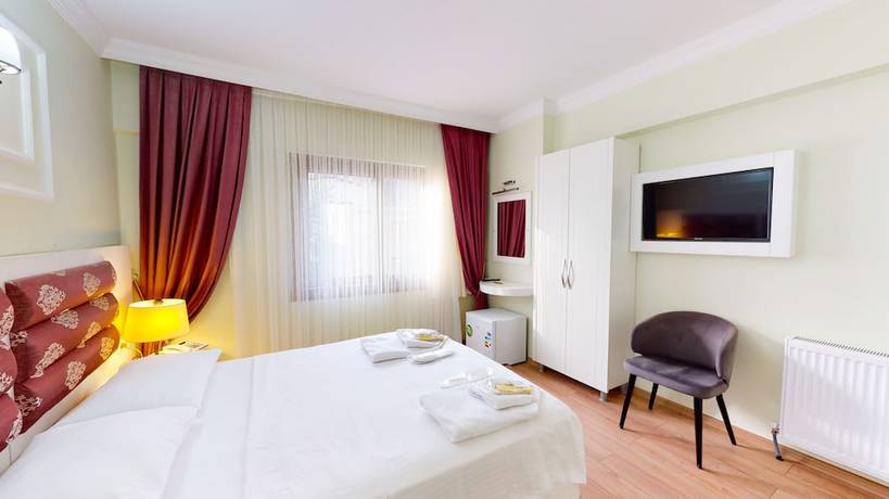 Imagen de la habitación del The Wolf Hotel. Foto 12