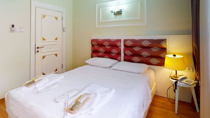 Imagen de la habitación del The Wolf Hotel. Foto 18