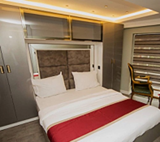 Imagen de la habitación del The Şişli Beijing Hotel. Foto 16