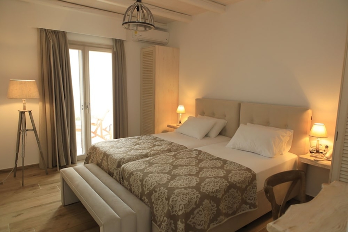 Imagen de la habitación del Theasis Luxury Suites. Foto 10