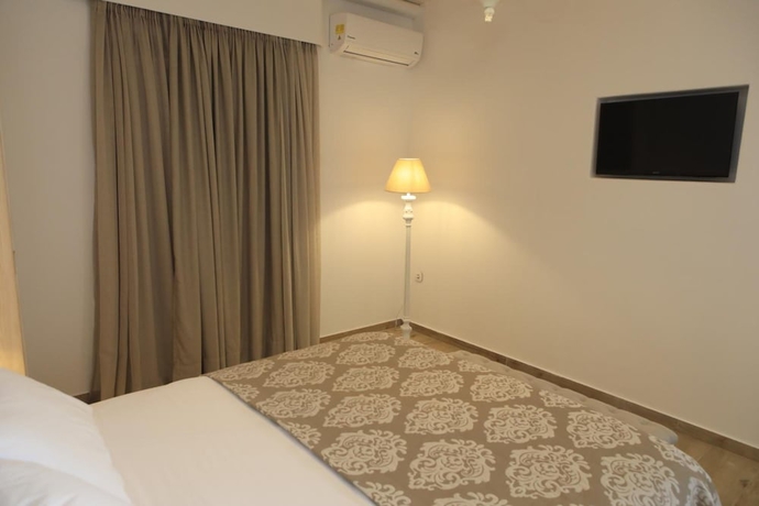 Imagen de la habitación del Theasis Luxury Suites. Foto 14