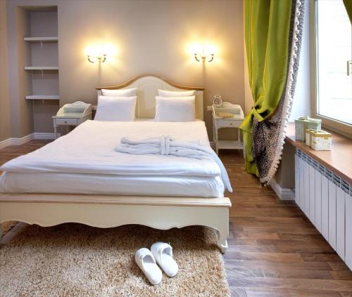 Imagen de la habitación del Theatre Boutique Apart-Hotel. Foto 7