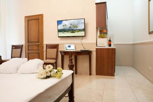 Imagen de la habitación del Theatre Boutique Apart-Hotel. Foto 8