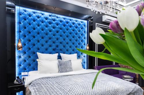 Imagen de la habitación del Theatre Boutique Apart-Hotel. Foto 10