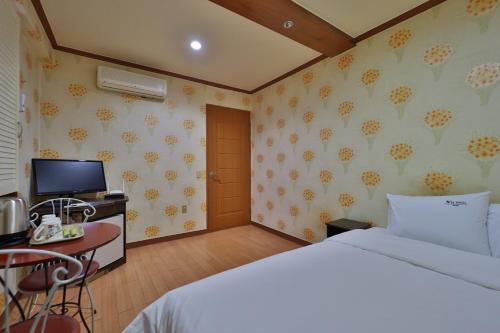 Imagen de la habitación del Theme Motel. Foto 19
