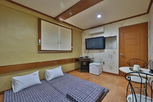 Imagen de la habitación del Theme Motel. Foto 20