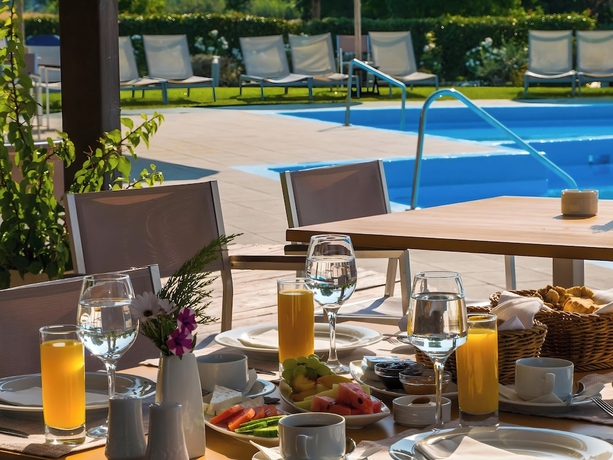 Imagen del bar/restaurante del Thessalikon Grand Hotel. Foto 5