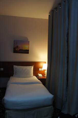 Imagen de la habitación del Three 888 Hotel. Foto 17