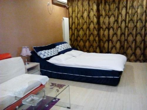 Imagen de la habitación del Tianjin Jiajia Apartment Nankai Joy City. Foto 7