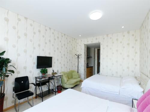 Imagen de la habitación del Tianjin Jiajia Apartment Nankai Joy City. Foto 8