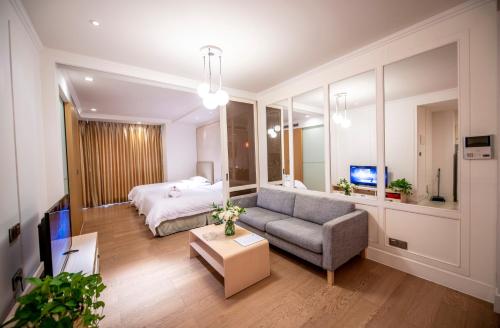Imagen de la habitación del Tianjin Tanggu Ruiwan International Apartment. Foto 6