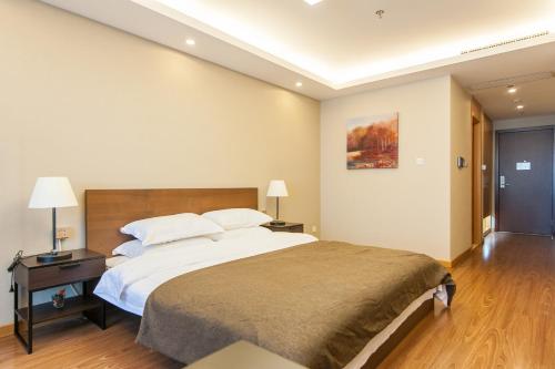 Imagen de la habitación del Tianjin Yoshi Luxury Apartment Xiaobailou Branch. Foto 6