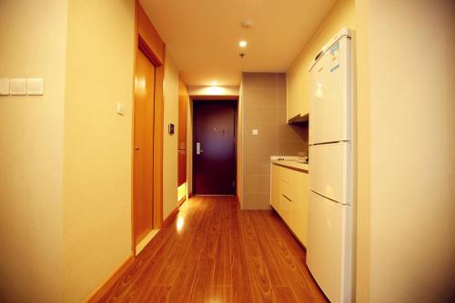 Imagen de la habitación del Tianjin Yoshi Luxury Apartment Xiaobailou Branch. Foto 8