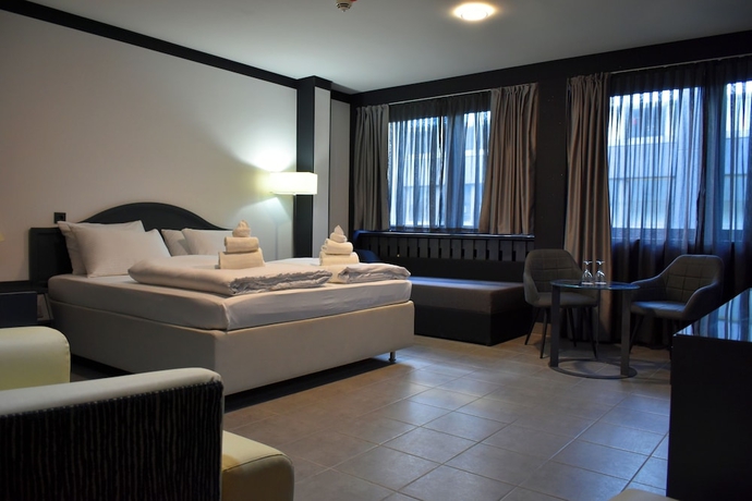 Imagen de la habitación del Tibet Hotel am Airport. Foto 3