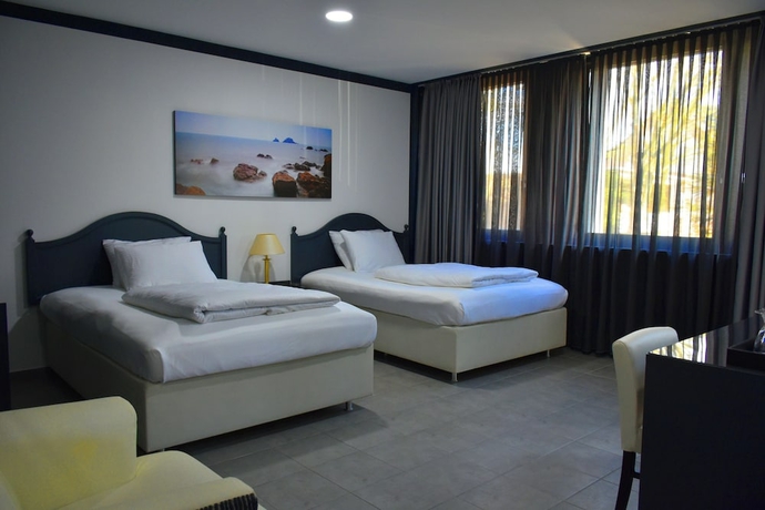 Imagen de la habitación del Tibet Hotel am Airport. Foto 4