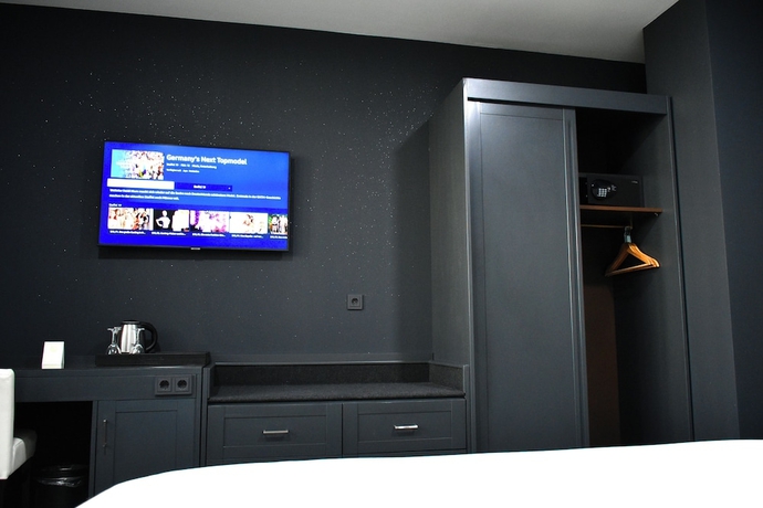 Imagen de la habitación del Tibet Hotel am Airport. Foto 10