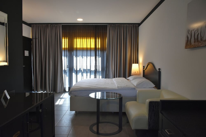 Imagen de la habitación del Tibet Hotel am Airport. Foto 11