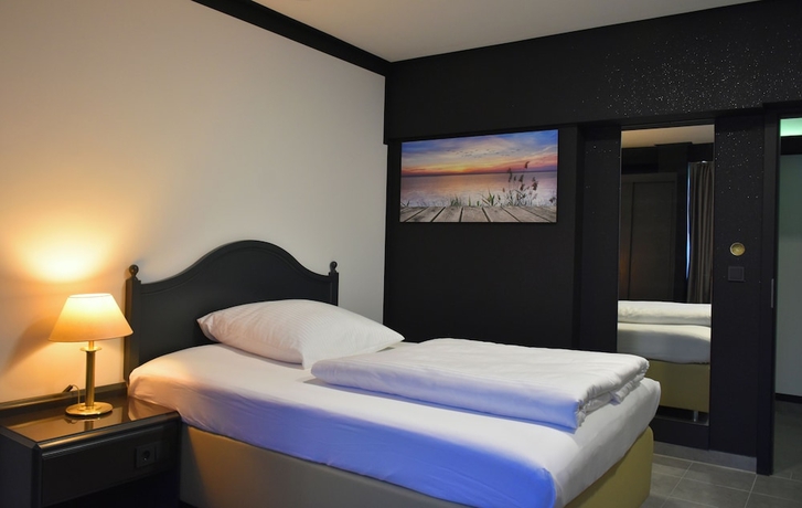Imagen de la habitación del Tibet Hotel am Airport. Foto 12