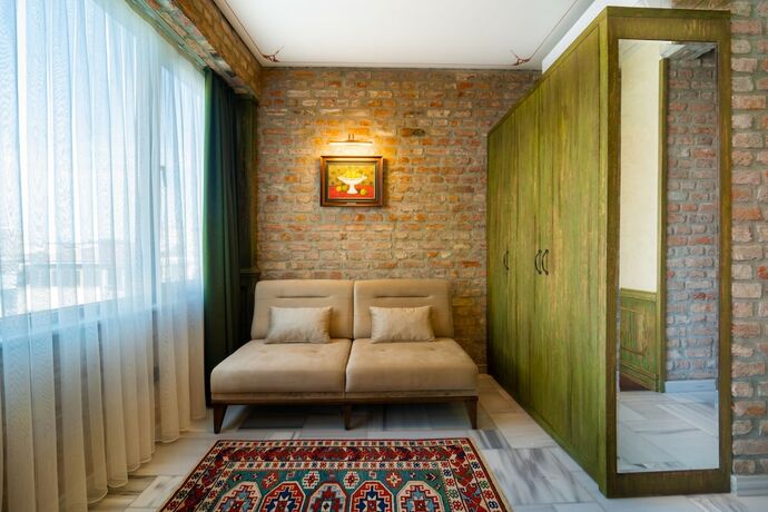 Imagen de la habitación del Tin Suites. Foto 17