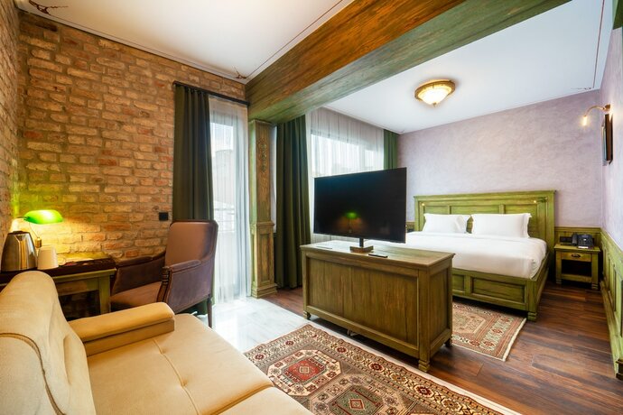 Imagen de la habitación del Tin Suites. Foto 19