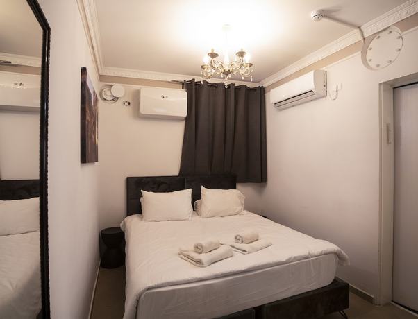 Imagen de la habitación del Tish ApartHotel. Foto 2