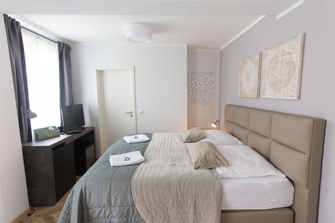 Imagen de la habitación del Tm Suites. Foto 3
