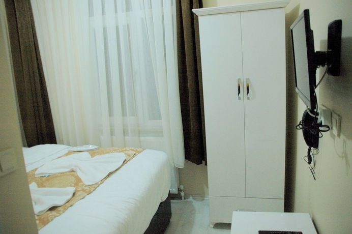 Imagen de la habitación del Tolga Hotel. Foto 10