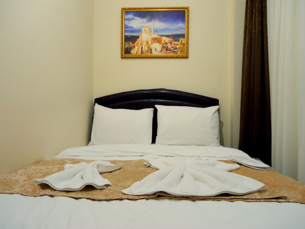 Imagen de la habitación del Tolga Hotel. Foto 11