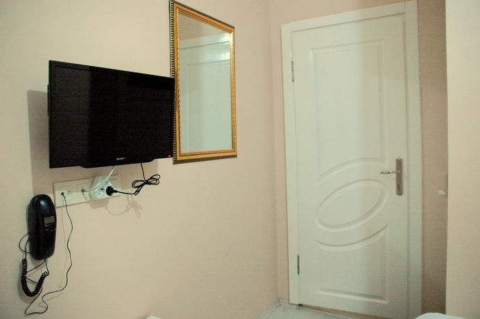 Imagen de la habitación del Tolga Hotel. Foto 14