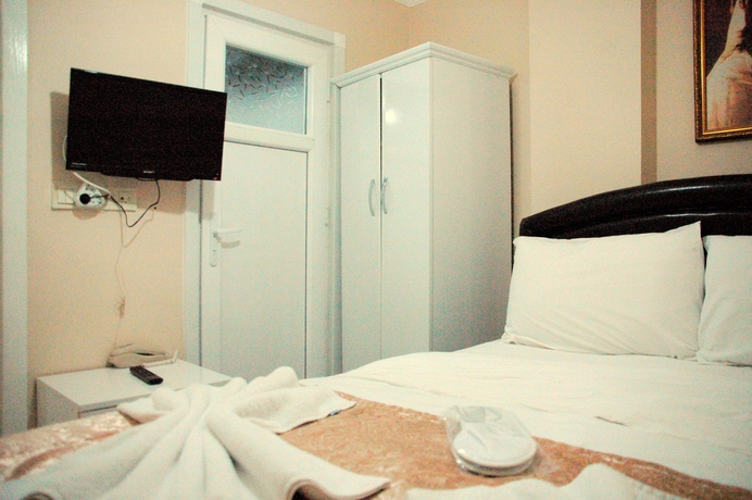 Imagen de la habitación del Tolga Hotel. Foto 15