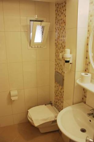 Imagen de la habitación del Toloman Hotel & Apartments. Foto 6