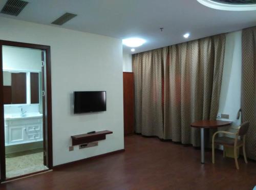 Imagen de la habitación del Tongling Qianhang Business Hotel. Foto 8