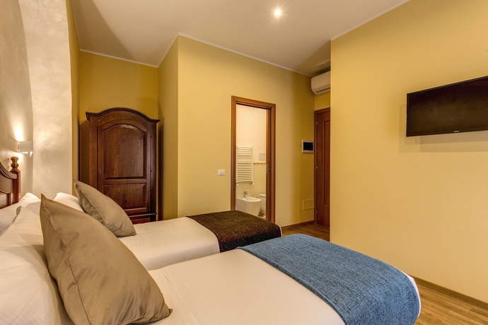 Imagen de la habitación del Top Floor Colosseo. Foto 2