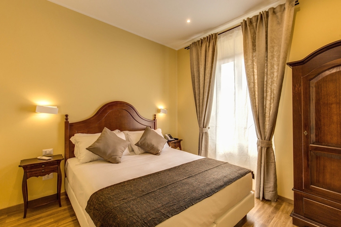 Imagen de la habitación del Top Floor Colosseo. Foto 4