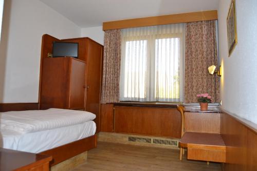 Imagen de la habitación del Top Hotel Garni. Foto 9