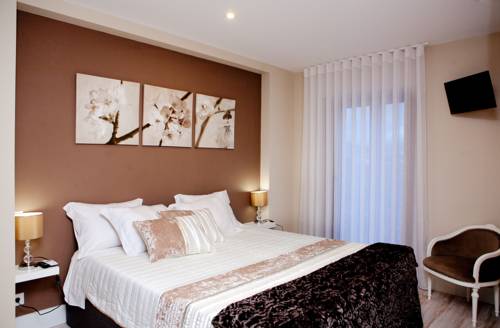 Imagen de la habitación del Top'Otel. Foto 12