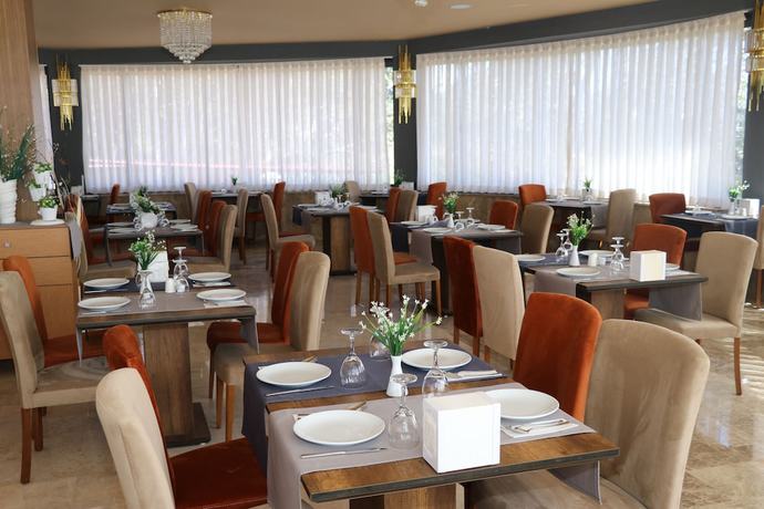 Imagen del bar/restaurante del Toros Holiday Resort And Spa. Foto 5