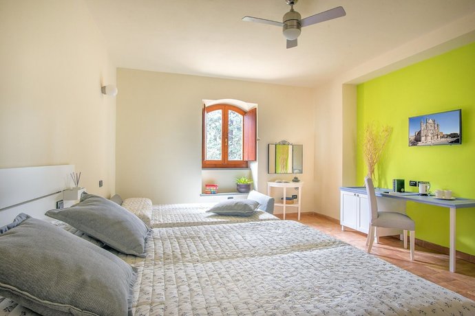 Imagen de la habitación del Torrenova di Assisi Country House. Foto 6