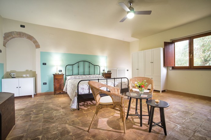 Imagen de la habitación del Torrenova di Assisi Country House. Foto 8