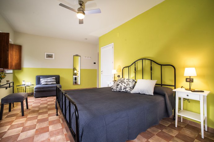 Imagen de la habitación del Torrenova di Assisi Country House. Foto 10